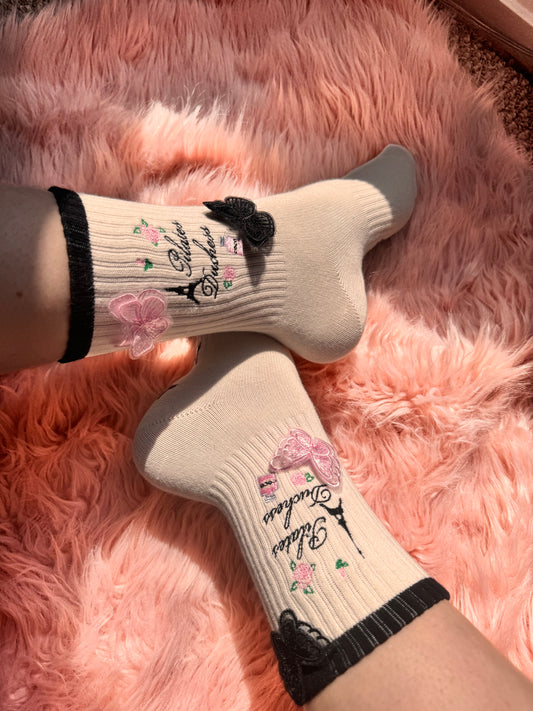 "Duchess in Paris" with butterfly's Pilates crew grip socks